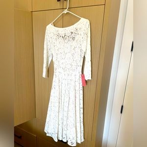 Name of Love Mackenzie Dress in white. Size six. Never worn, tags on.